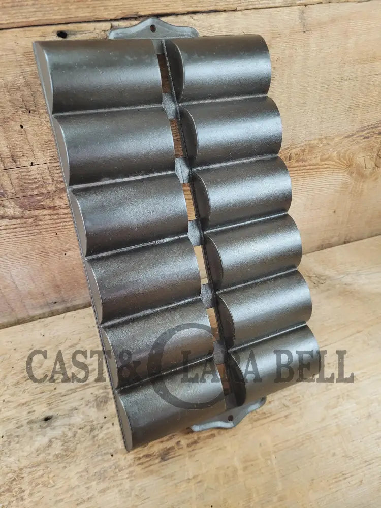 1900βs Griswold New England style (N.E.S embossed) βFrench Rollβ Style cast iron bread pan