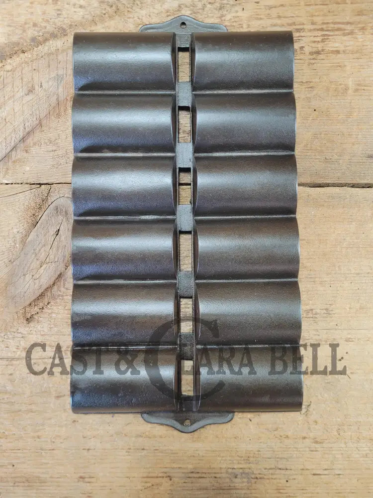1900βs Griswold New England style (N.E.S embossed) βFrench Rollβ Style cast iron bread pan