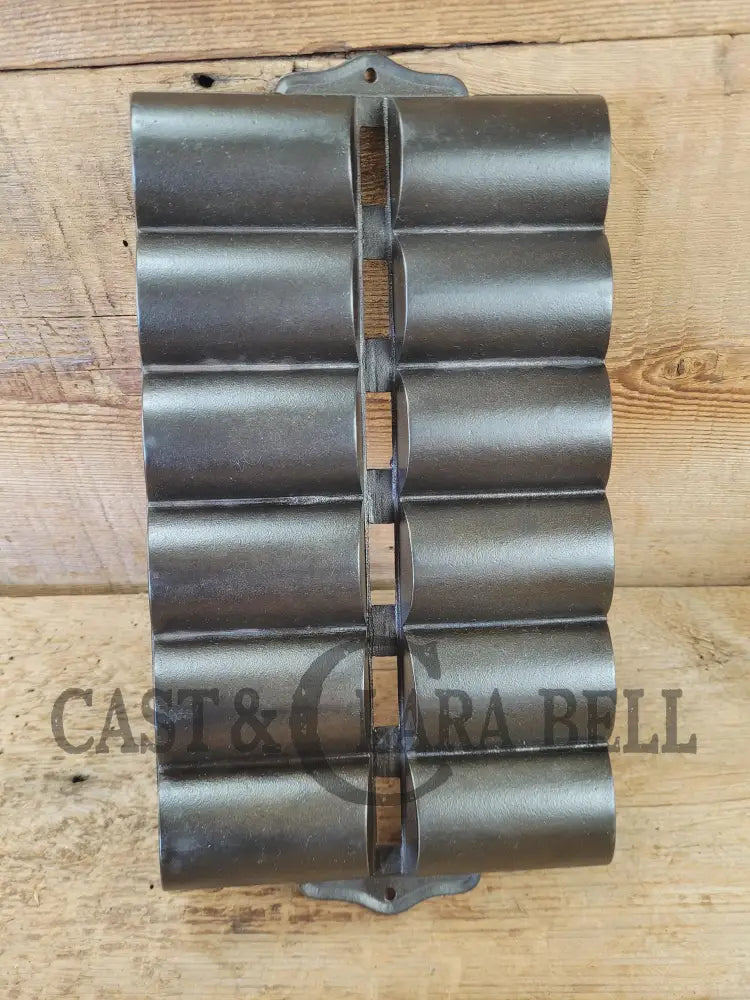 1900βs Griswold New England style (N.E.S embossed) βFrench Rollβ Style cast iron bread pan