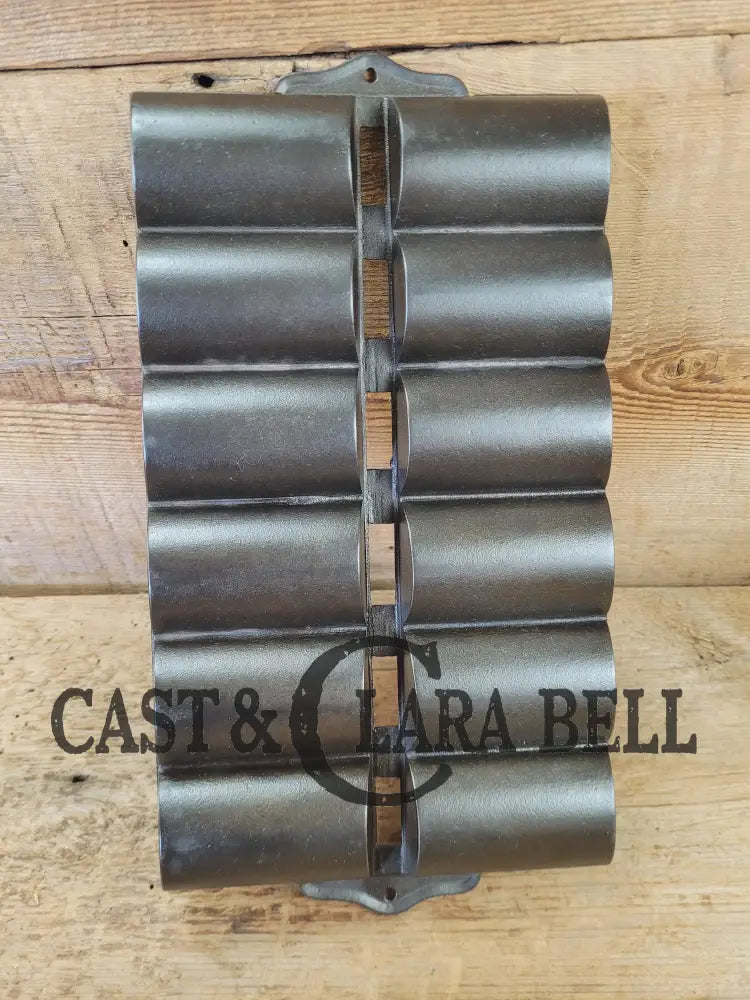 1900βs Griswold New England style (N.E.S embossed) βFrench Rollβ Style cast iron bread pan