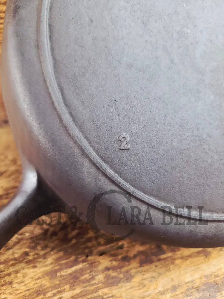 1910’s very early Lodge #8 Cast Iron Skillet with Single Notch and Raised #2 at 6 O’clock position Skillet