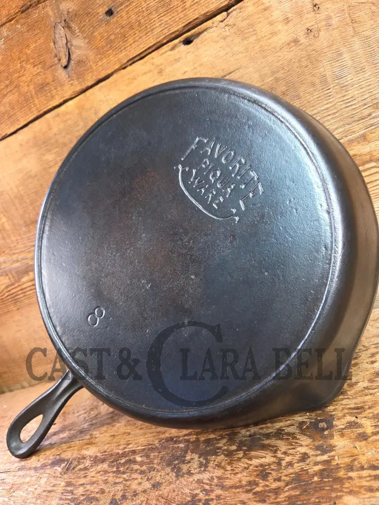 1920βs Favorite Piqua Ware #8 Cast Iron Skillet with Heat Ring and Smiley Logo Skillet