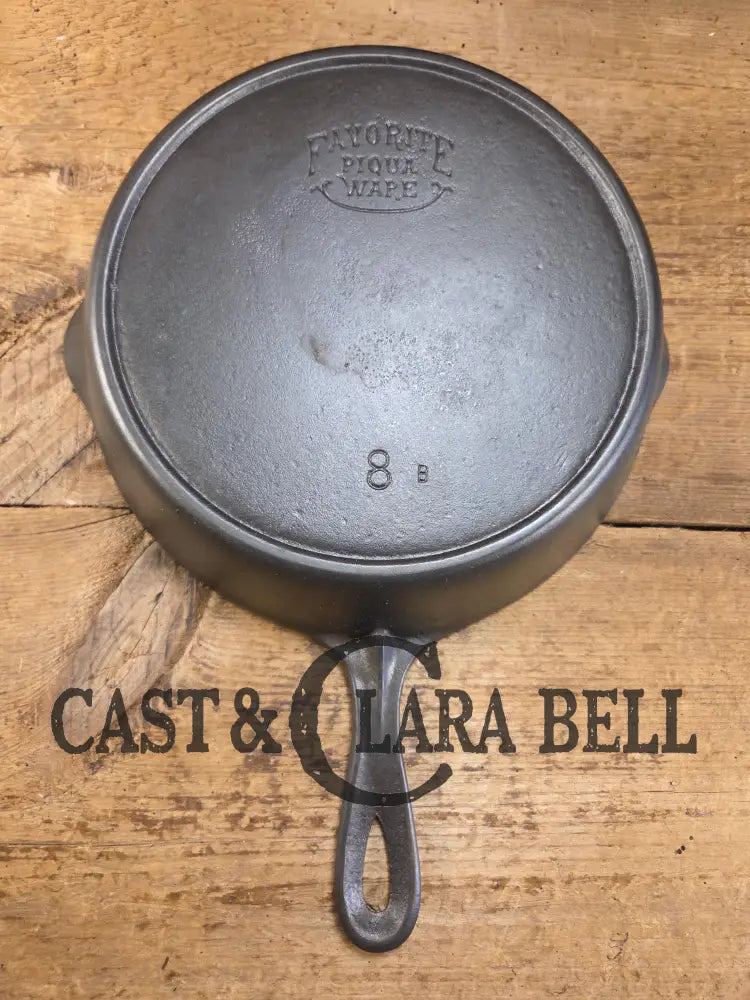 1920’s Favorite Piqua Ware #8 Cast Iron Skillet with Heat Ring and Smiley Logo 8B. SC24 Skillet