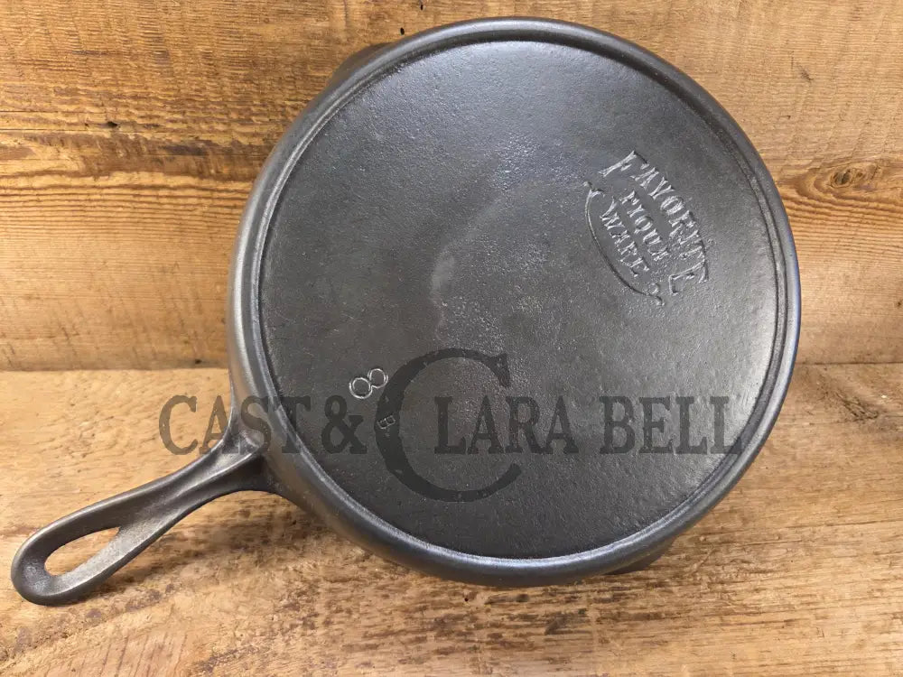 1920βs Favorite Piqua Ware #8 Cast Iron Skillet with Heat Ring and Smiley Logo 8B. SC24 Skillet