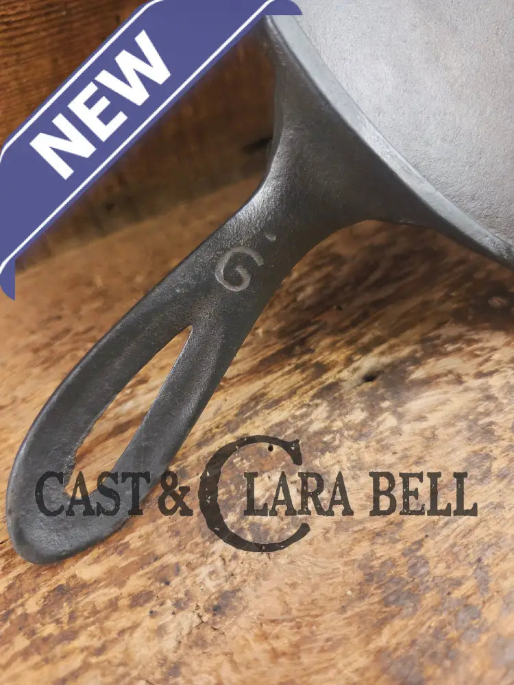 1920’s Favorite Piqua Ware #9 Round Cast Iron Griddle with Smiley Logo and Ghost mark block logo. Griddle