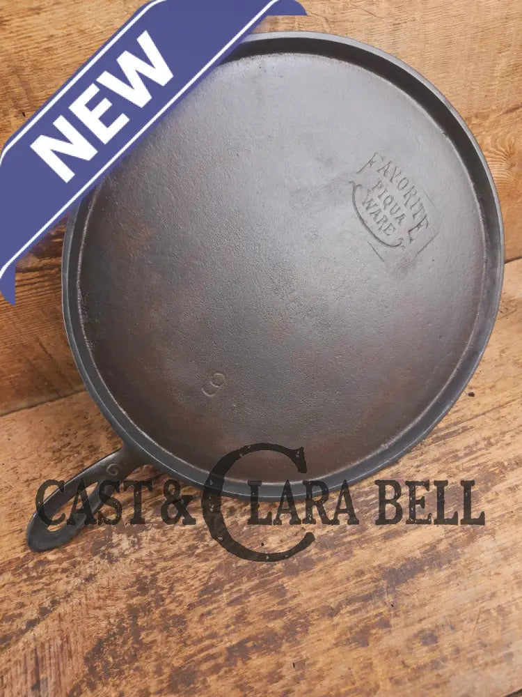 1920’s Favorite Piqua Ware #9 Round Cast Iron Griddle with Smiley Logo and Ghost mark block logo. Griddle