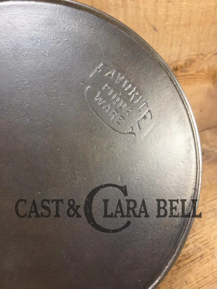 1920’s Favorite Piqua Ware No. 9 B cast iron Skillet with Heat Ring and ’Smiley’ Logo. Gorgeous skillet restored and
