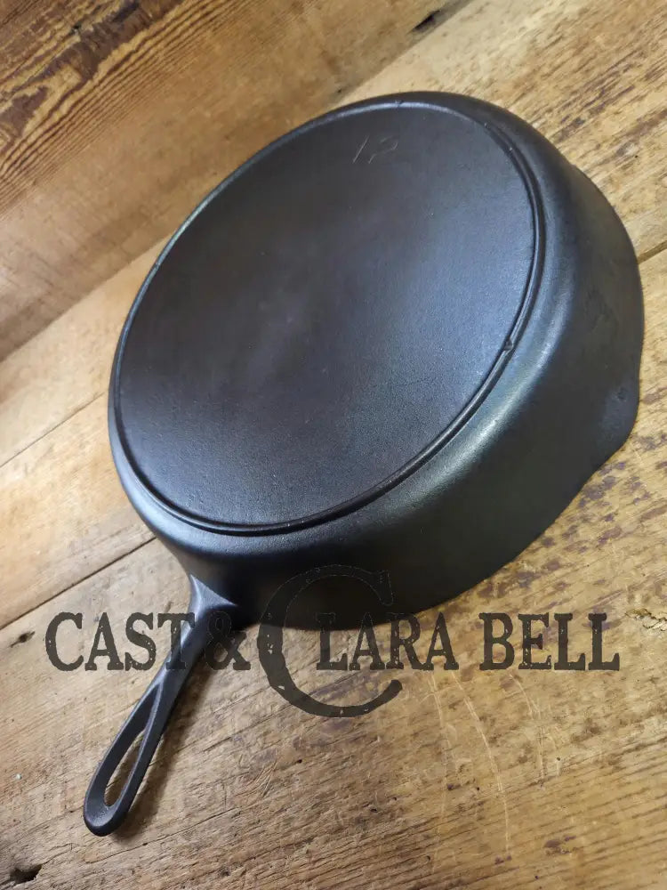 1930’s era Lodge #12 Cast Iron Skillet with 3 Notch Heat Ring. HUGE and perfect for large batch cooking. Gas or