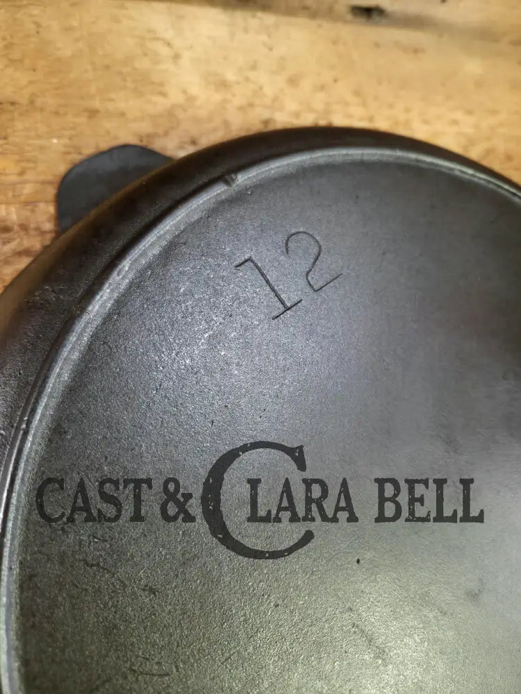 1930’s era Lodge #12 Cast Iron Skillet with 3 Notch Heat Ring. HUGE and perfect for large batch cooking. Gas or