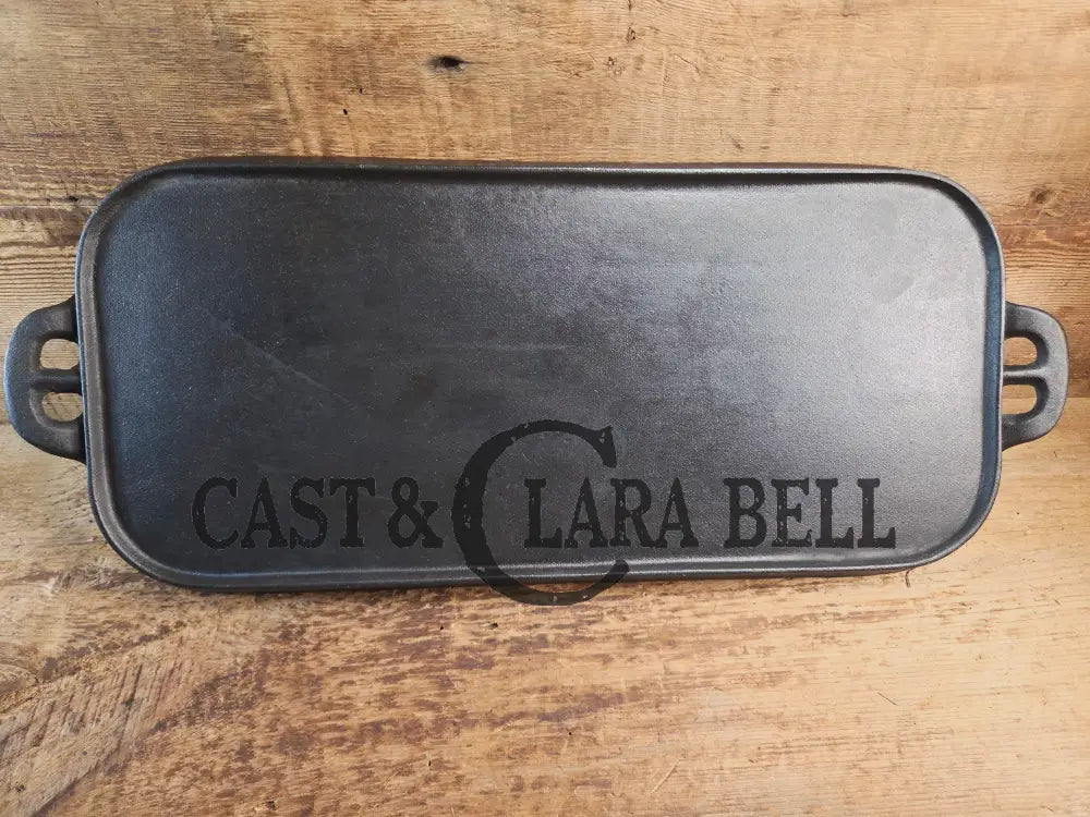 1930’s era Lodge 7 Long Griddle. Very handy size to have for the grill or stove top! Restored and ready to Use! Skillet