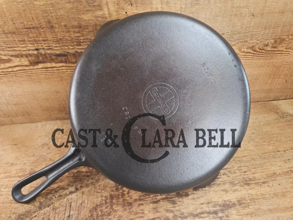 1940โs Griswold No. 8 Cast Iron Skillet with Small Block Logo and Smooth Bottom with GROOVE handle! 704 A Skillet