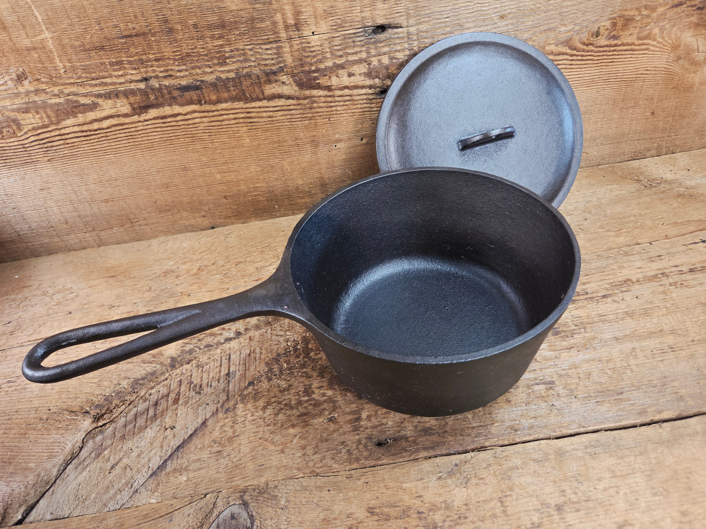 Lovely Lodge #2 quart sauce pan with lid!  Perfect bean pot for your grill!