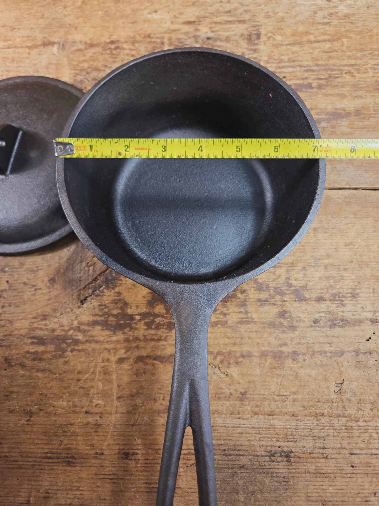 Lovely Lodge #2 quart sauce pan with lid!  Perfect bean pot for your grill!