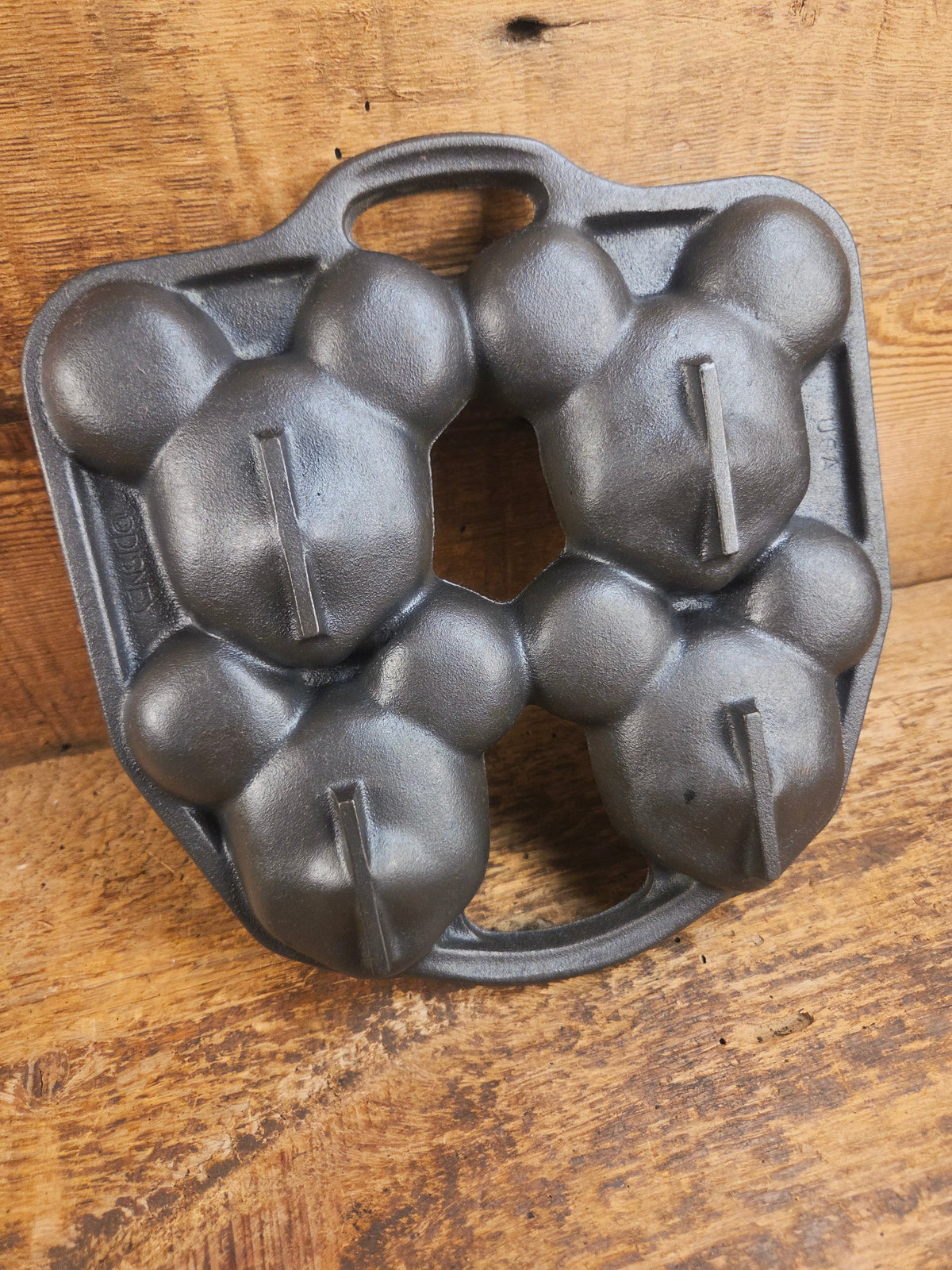 So cool! Lodge made Mickey Mouse Gem Pan. Makes great mini cakes! - Bakeware