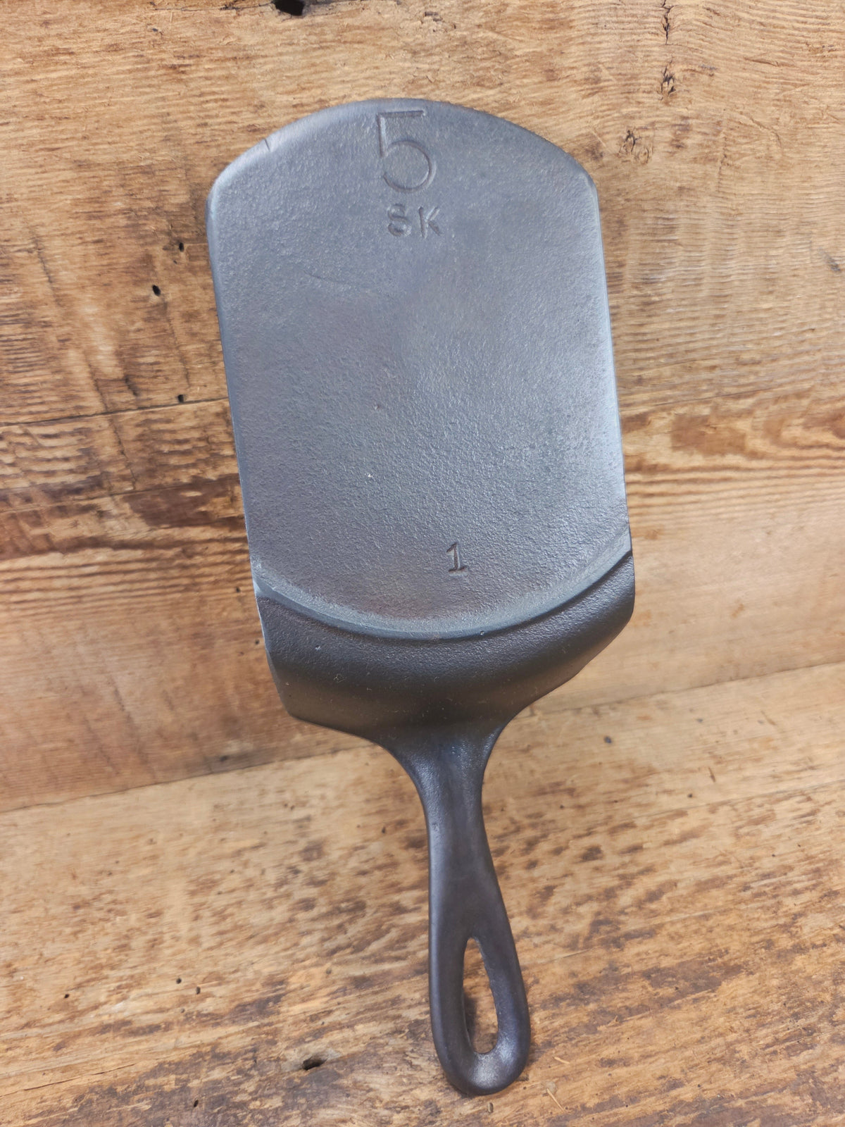 Custom made #5 Lodge Cast Iron Skillet Spatula. Reclaimed from a early to mid 1900’s three notch Lodge skillet. Great