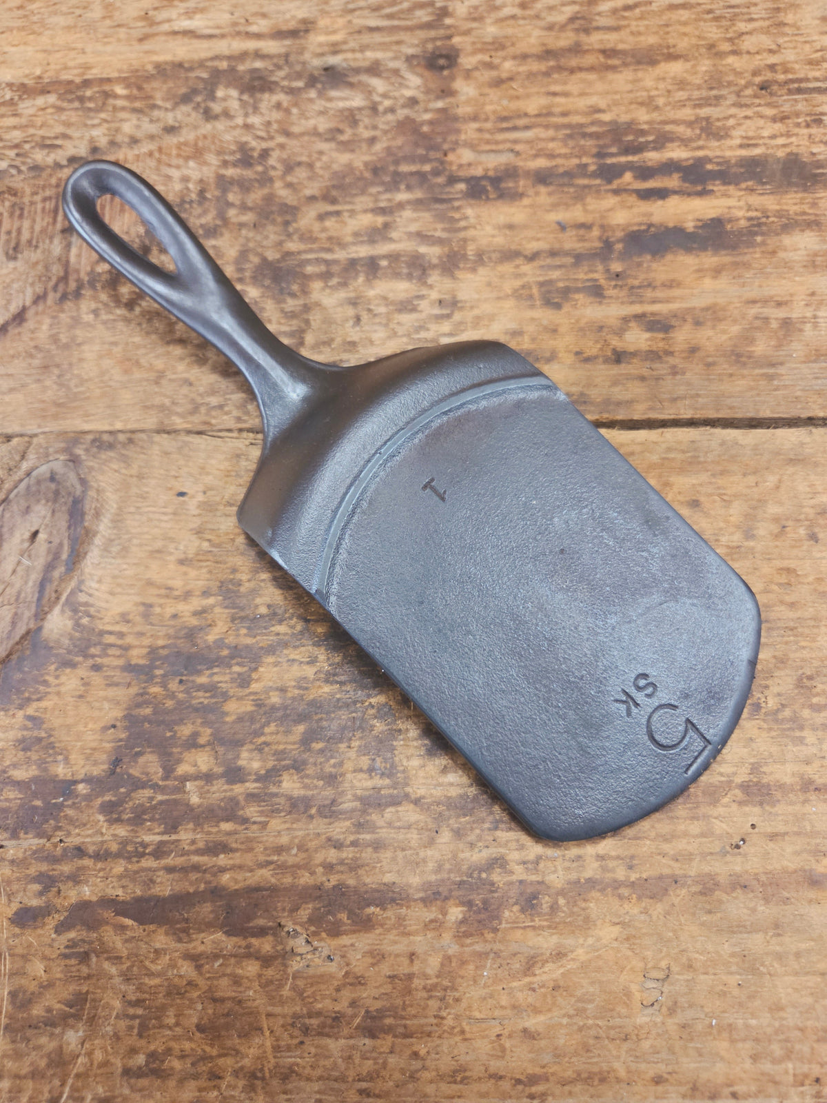 Custom made #5 Lodge Cast Iron Skillet Spatula. Reclaimed from a early to mid 1900’s three notch Lodge skillet. Great