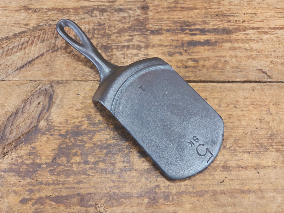 Custom made #5 Lodge Cast Iron Skillet Spatula. Reclaimed from a early to mid 1900’s three notch Lodge skillet. Great