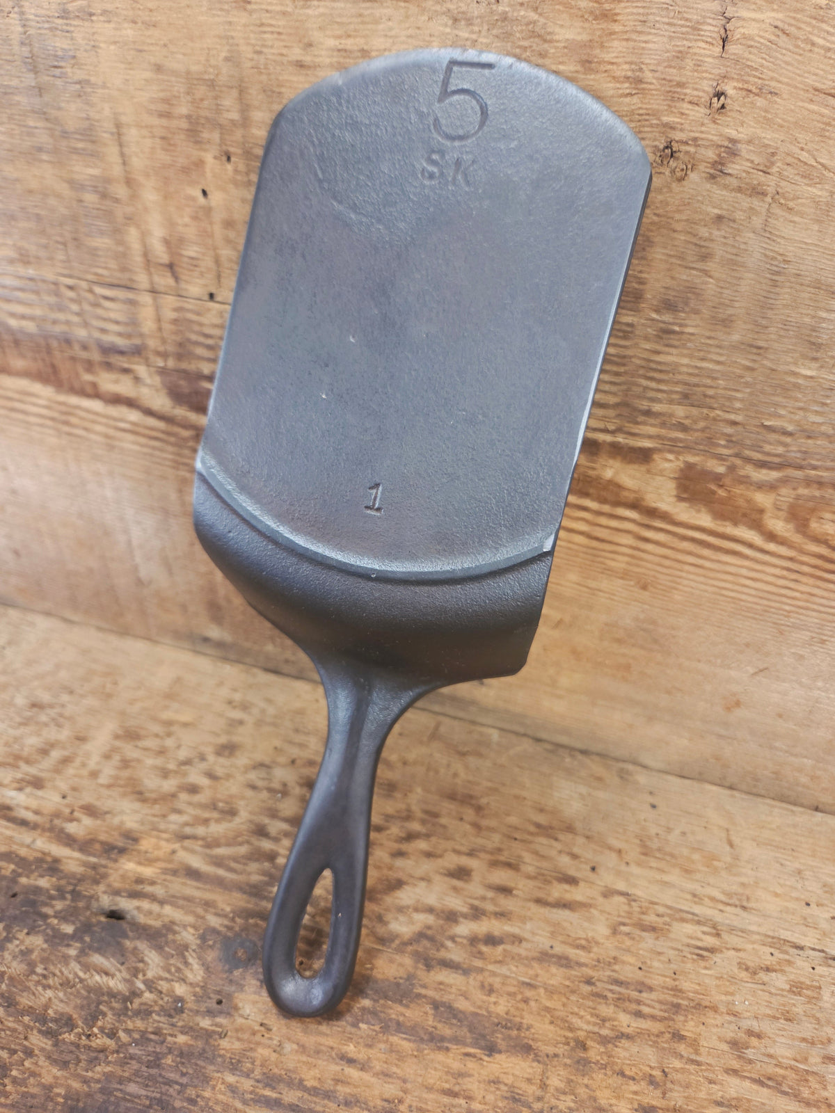 Custom made one of a kind vintage Lodge 5SK 1 repurposed spatula. Turned an ordinary cracked skillet into a grill
