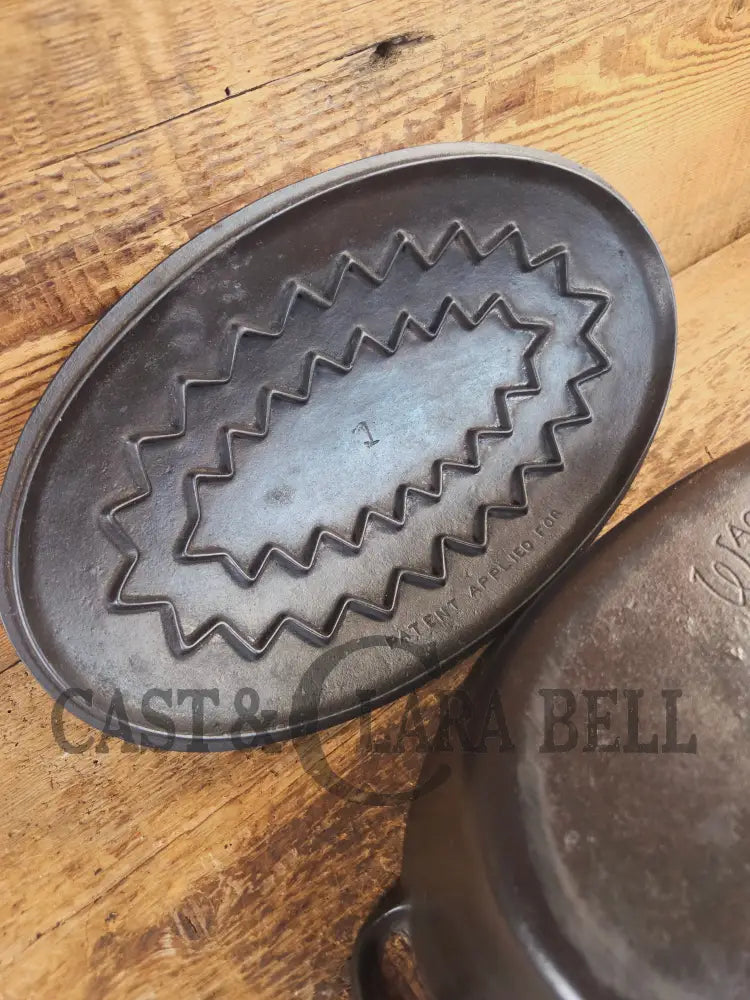 A bread maker’s dream. Very Hard to Find Wagner Stylized Logo Oval Roaster with Turtle Top sawtooth drip lid - Dutch