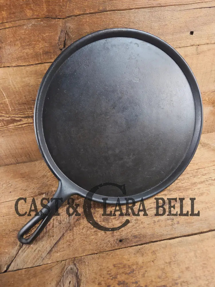Amazing! Antique #14 handled gate marked round griddle! We’ve never seen one like this. PERFECT pizza peel or griddle