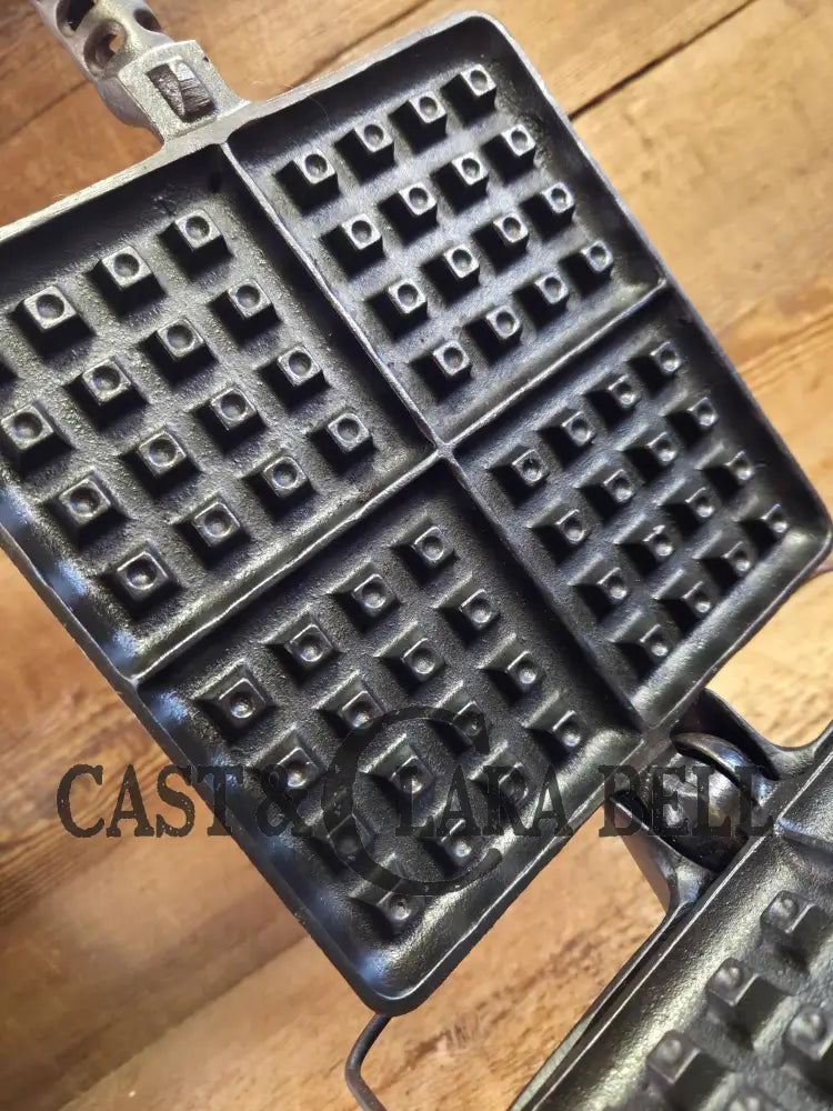 An absolute favorite! 1910’s Era HTF 1920’s Griswold #11 Square Waffle Iron w/ Raised Letter New American Logo. Raised