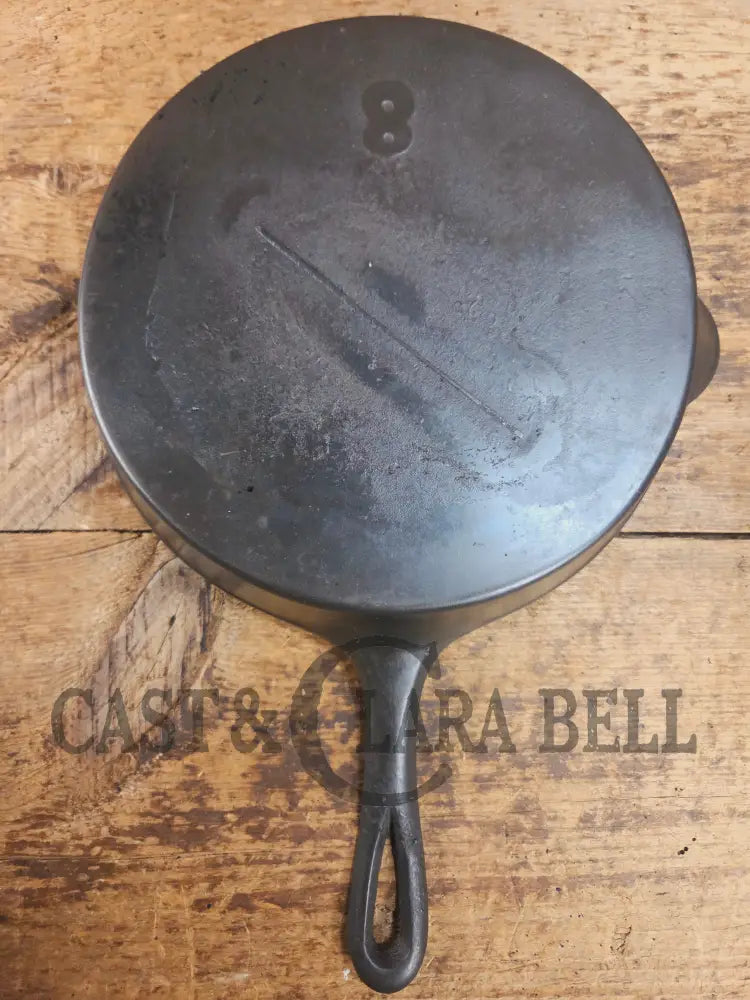 Antique gate-marked unknown #8 skillet. Est 1880βs. Left single spout heat ring bottom w/ semi fancy handle Skillet