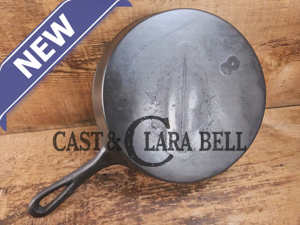 Antique gate-marked unknown #8 skillet. Est 1880βs. Left single spout heat ring bottom w/ semi fancy handle Skillet