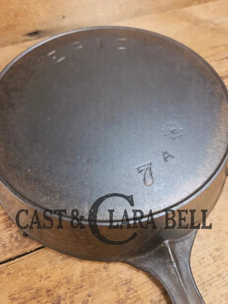 Awesome! 1890βs Griswold ERIE 2nd Series #7 Skillet with Heat Ring and Makerβs Mark Flower and nickel finish! Donβt