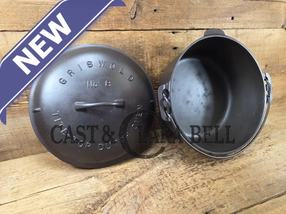 Awesome! 1920âs Griswold #8 Tite-Top Cast Iron Dutch Oven 833 F and high dome matching Griswold Lid 2551. Skillet