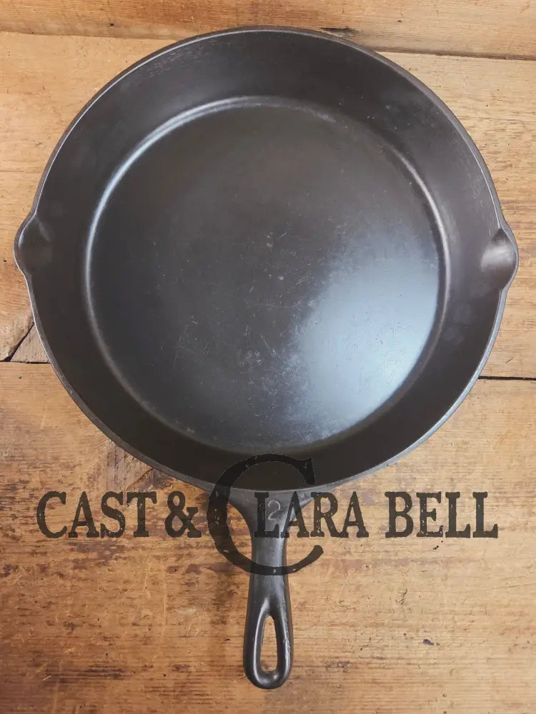 Awesome and tough to find! Scarce smooth bottom #12 Vollrath cast iron skillet. This is a conversation starter! Skillet