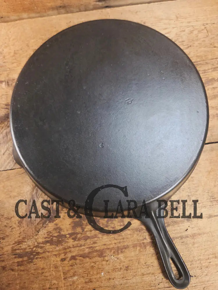 Awesome and tough to find! Scarce smooth bottom #12 Vollrath cast iron skillet. This is a conversation starter! Skillet