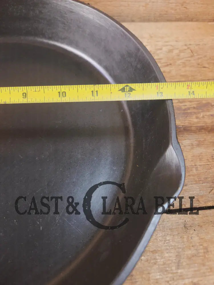 Awesome and tough to find! Scarce smooth bottom #12 Vollrath cast iron skillet. This is a conversation starter! Skillet