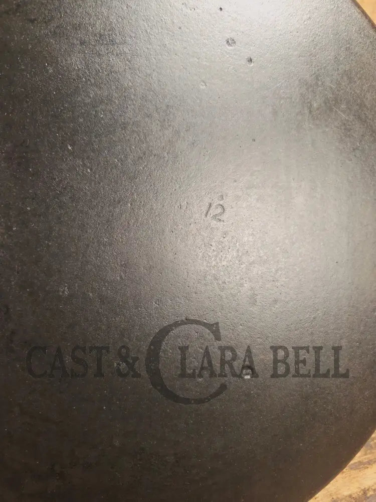 Awesome and tough to find! Scarce smooth bottom #12 Vollrath cast iron skillet. This is a conversation starter! Skillet