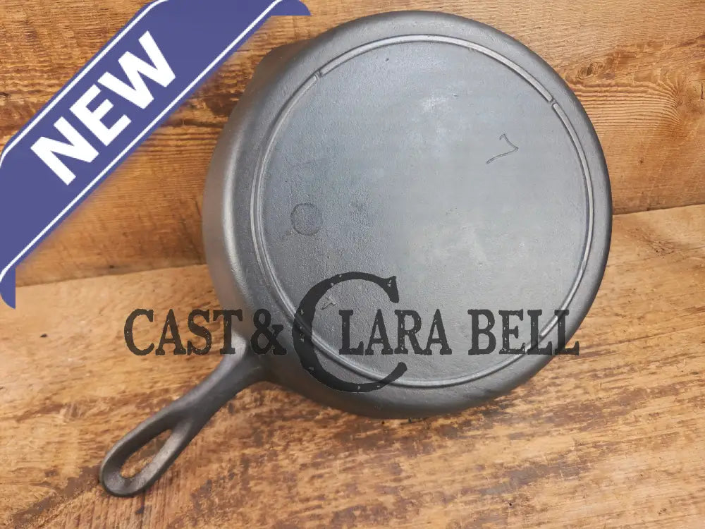 Classic 1910βs Lodge #7 Cast Iron Skillet Three Notch with raised T. Light sleek and ready to cook with! Skillet