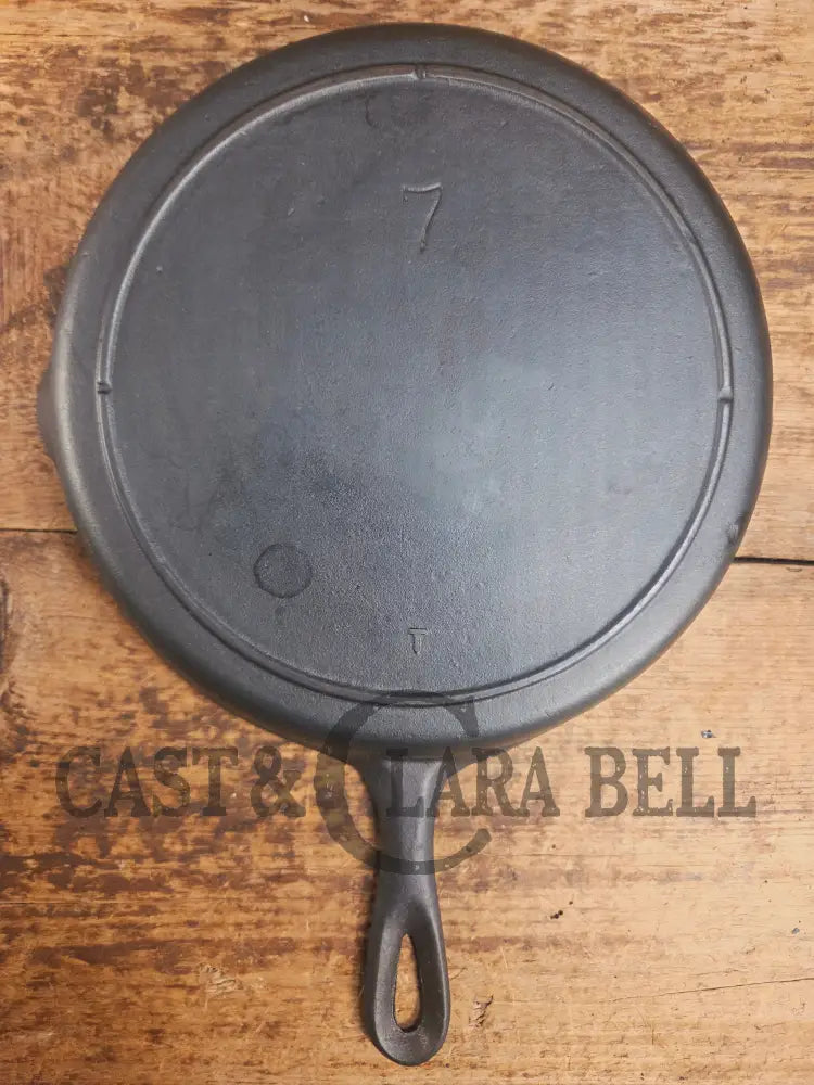 Classic 1910βs Lodge #7 Cast Iron Skillet Three Notch with raised T. Light sleek and ready to cook with! Skillet