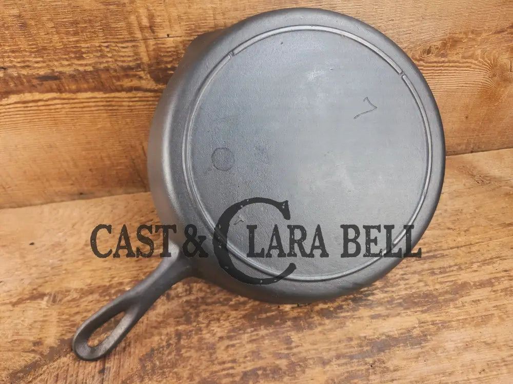 Classic 1910βs Lodge #7 Cast Iron Skillet Three Notch with raised T. Light sleek and ready to cook with! Skillet