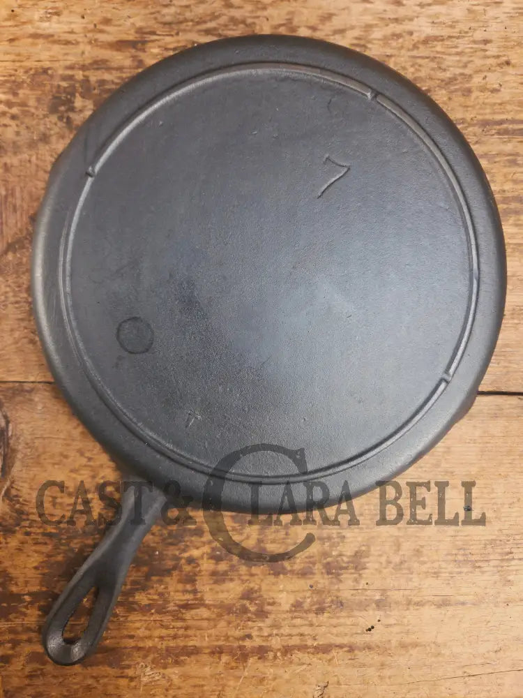 Classic 1910βs Lodge #7 Cast Iron Skillet Three Notch with raised T. Light sleek and ready to cook with! Skillet