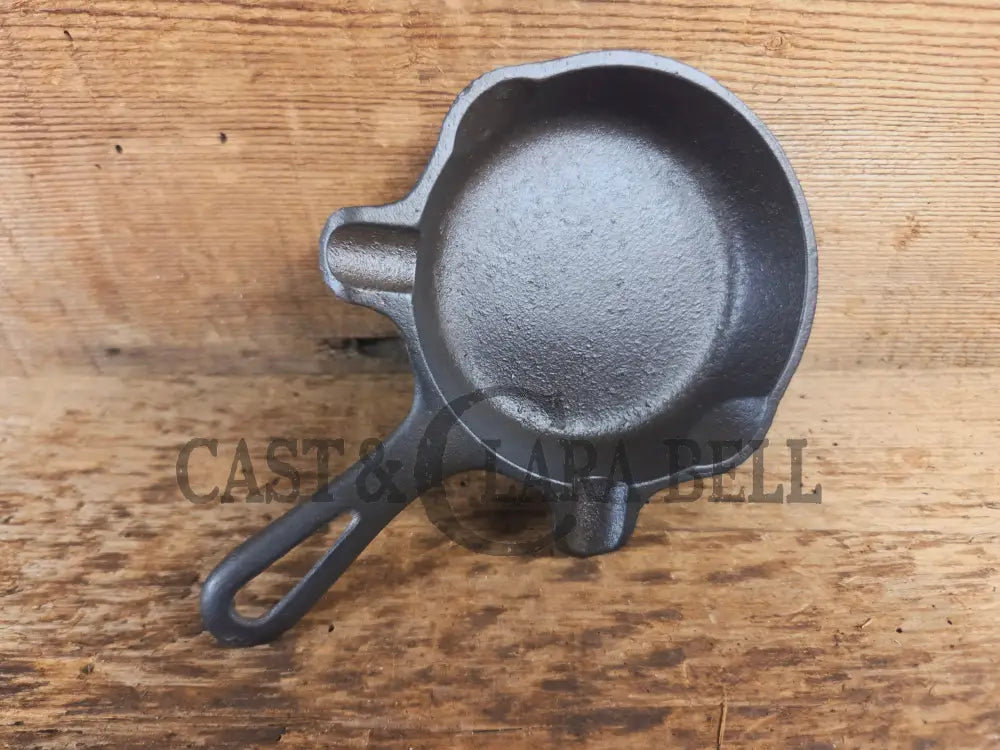 Collectible Griswold ’00’’ Ashtray / Spoon Rest No match holder. Small Novelty cast iron skillet for display or stove!