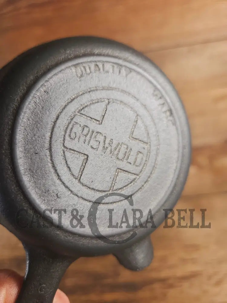 Collectible Griswold ’00’’ Ashtray / Spoon Rest No match holder. Small Novelty cast iron skillet for display or stove!
