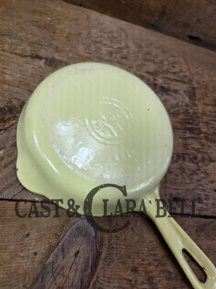 Cool and not often seen! 1940’s Griswold No. 3 ’Yellow and Cream’ enameled Cast Iron Egg Skillet 709