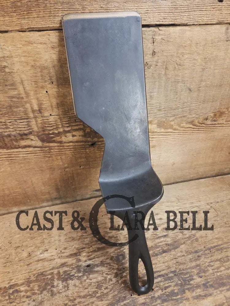 Custom and Funky! Cast Iron Spatula made from a cracked Griswold Large Block 7 Skillet. Funky crack was cut away