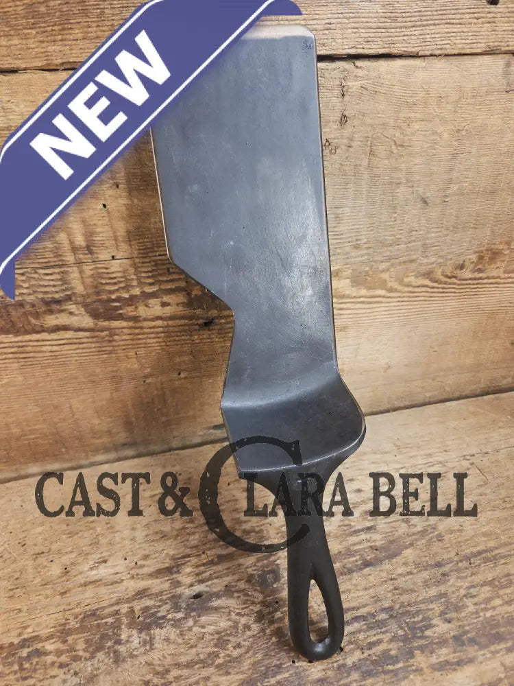 Custom and Funky! Cast Iron Spatula made from a cracked Griswold Large Block 7 Skillet. Funky crack was cut away