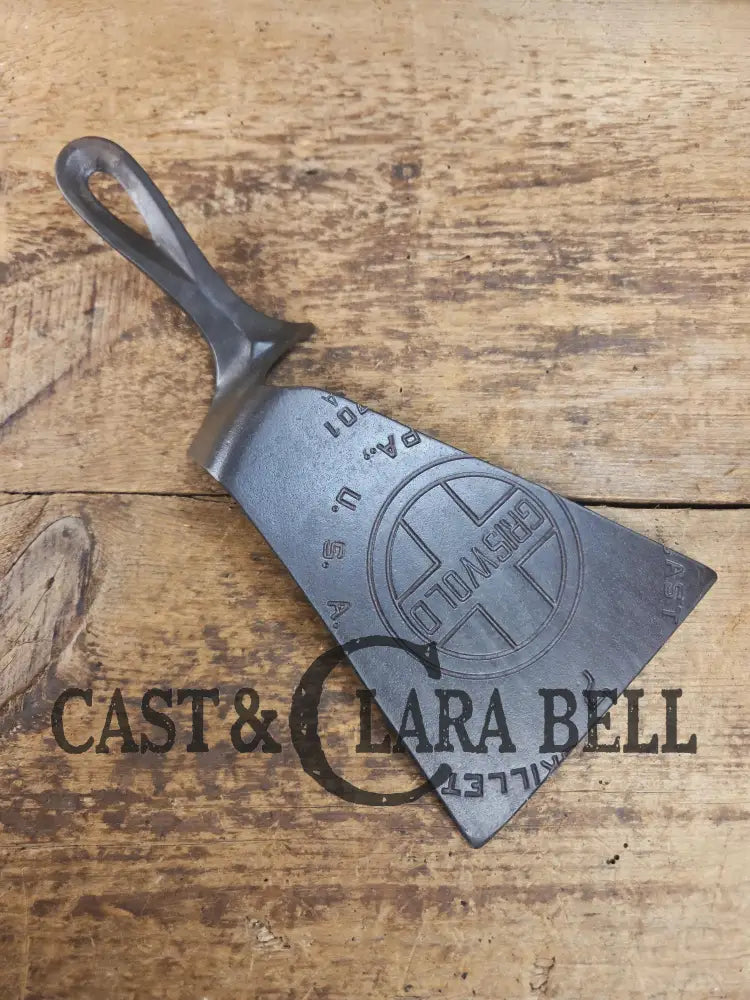 Custom and Funky! Cast Iron Spatula made from a cracked Griswold Large Block 7 Skillet. Funky crack was cut away