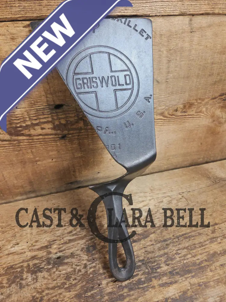 Custom and Funky! Cast Iron Spatula made from a cracked Griswold Large Block 7 Skillet. Funky crack was cut away