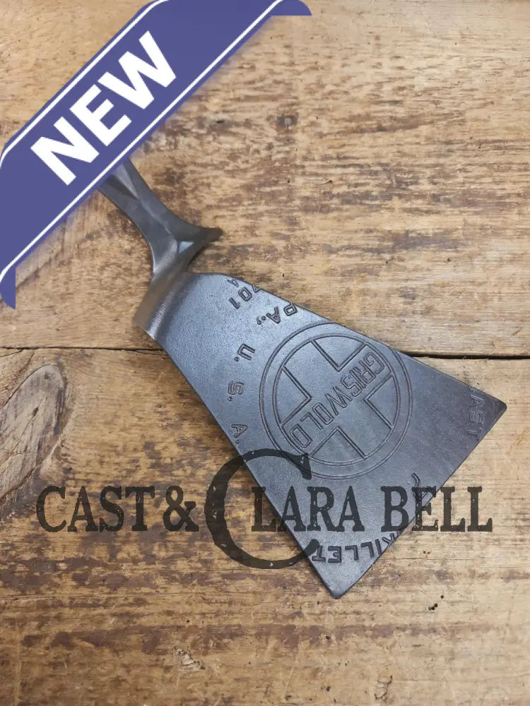 Custom and Funky! Cast Iron Spatula made from a cracked Griswold Large Block 7 Skillet. Funky crack was cut away