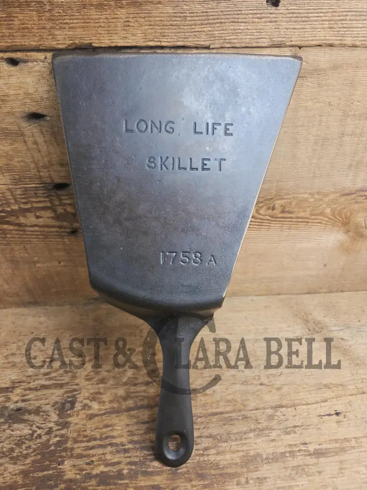 Custom and Funky! Wagner made(#1758) βLong Lifeβ Cast Iron Skillet Spatula. Reclaimed 1920βs Era #8 skillet. Great