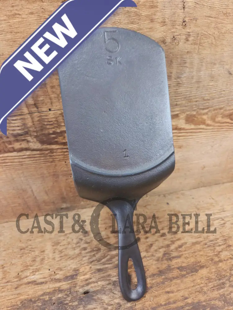 Custom made #5 Lodge Cast Iron Skillet Spatula. Reclaimed from a early to mid 1900’s three notch Lodge skillet. Great