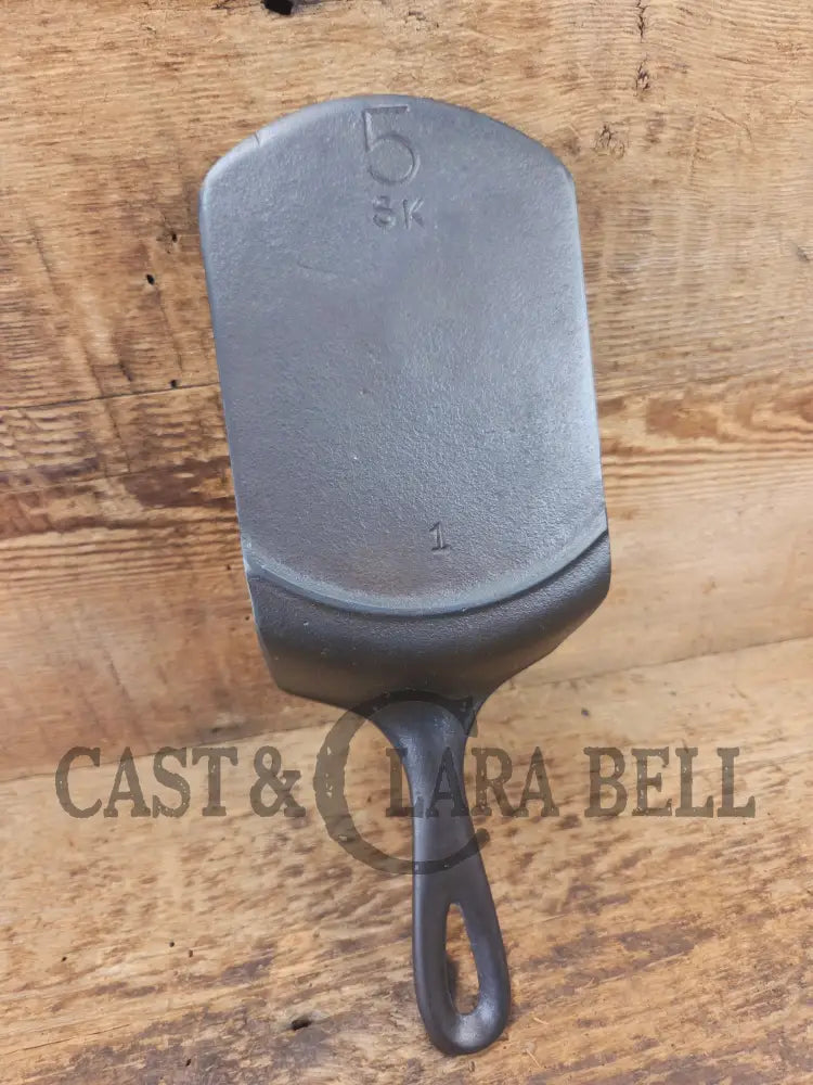 Custom made #5 Lodge Cast Iron Skillet Spatula. Reclaimed from a early to mid 1900’s three notch Lodge skillet. Great