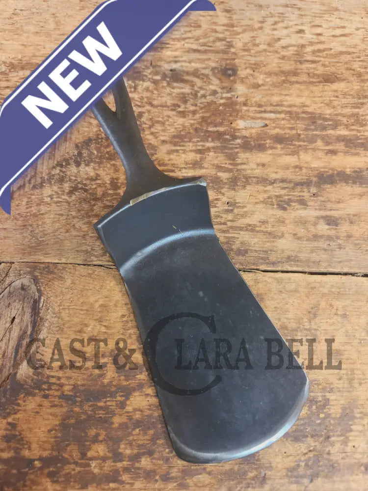 Custom made #5 Lodge Cast Iron Skillet Spatula w RAISED B. Reclaimed from a early to mid 1900’s single notch Lodge