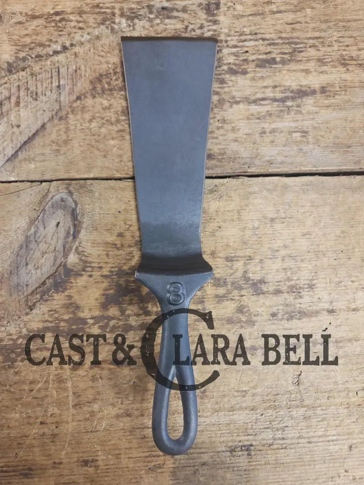 Custom made from a Raised #8 Lodge Arc Logo Cast Iron Skillet Spatula. A collectorsâ prize to own repurposed for a